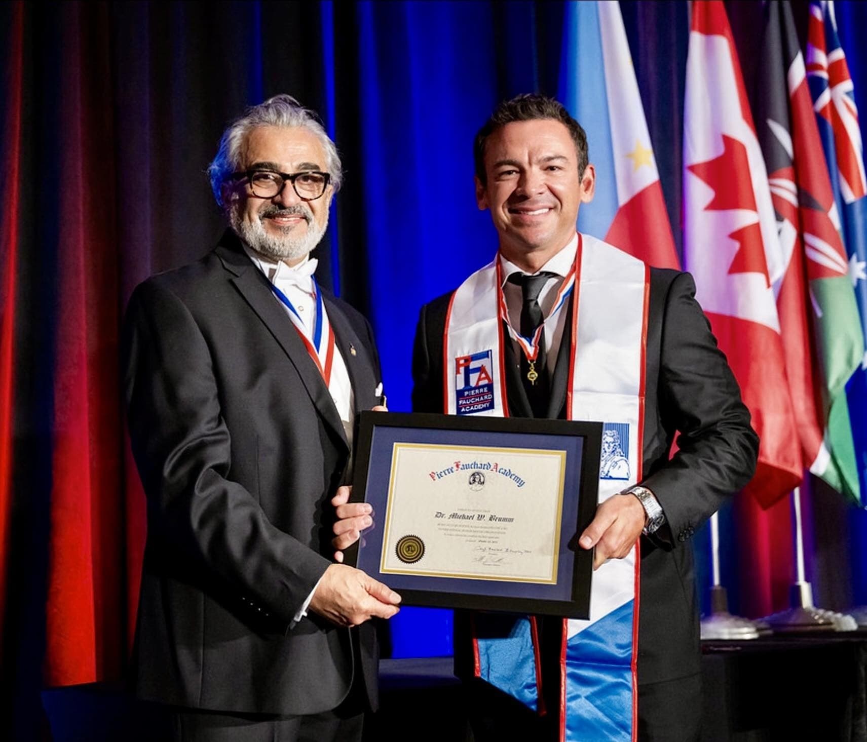 Dr. Michael Brumm being inducted as a Fellow of the Pierre Fauchard Academy